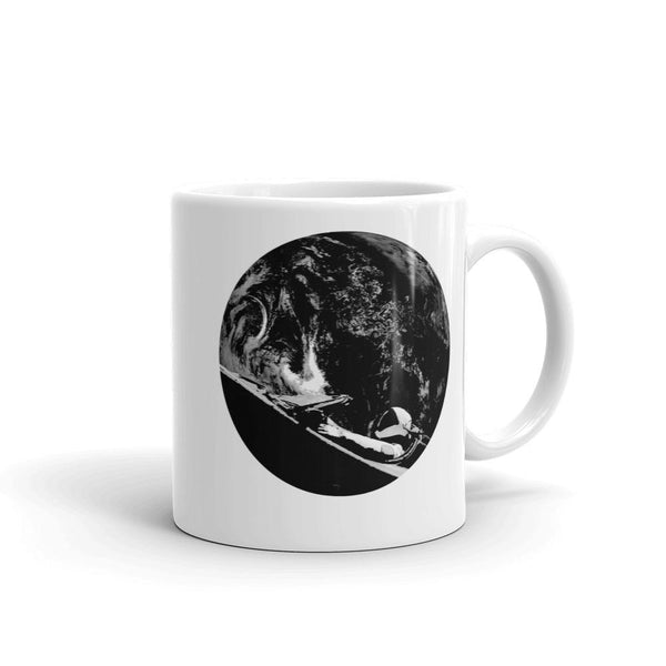 Unisex Starman mug is Inspired by the SpaceX Falcon Heavy Starman in a Tesla launched by Elon Musk. This coffee mug has a black and white image of the mannequin driving a Tesla Roadster in space in front of earth.  