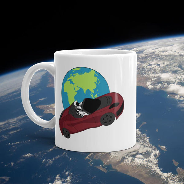 Starman coffee mug Inspired by the SpaceX Falcon Heavy Starman in a Tesla launched by Elon Musk. This mug has the astronaut mannequin driving a Tesla Roadster in space in front of earth.